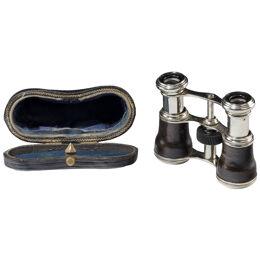 A Pair Of Vintage Opera Glasses In Their Original Case