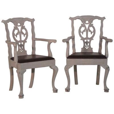 Pair of  Richly Carved Armchairs with Leatherseats, circa 100 years old.