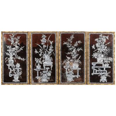 Set of four Asian-style lacquer panels. 1950s.