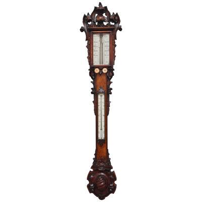 19th Century carved oak cased stick barometer