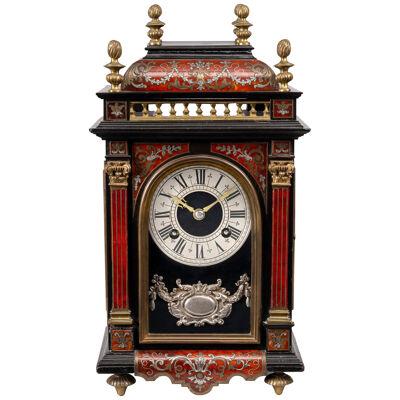 19TH CENTURY FRENCH RED TORTOISESHELL AND PEWTER MANTEL CLOCK BY MARTI OF PARIS