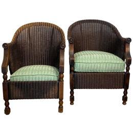 Pair Of Antique Loyd Loom chairs