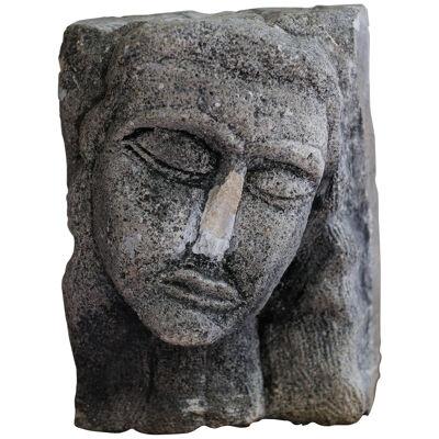 Stone carved head