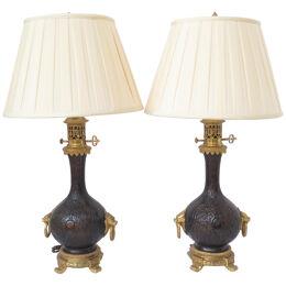 Pair Of Chinoiserie Bronzed Metal Electrified Oil Lamps