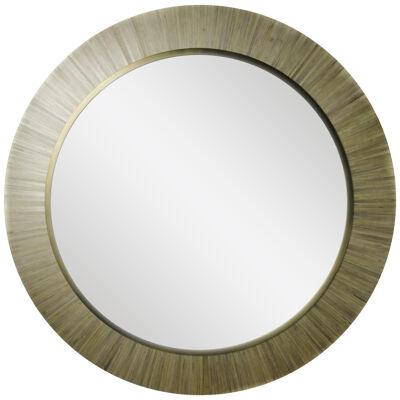 A contemporary, modernist round mirror, executed in meticulous straw marquetry.