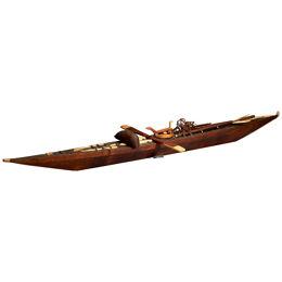 Inuit Model Kayak.Wooden frame covered with seal skin, lined with bone
