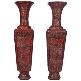 A Monumental and Rare Pair of Chinese Cinnabar Carved Lacquer Vases, Qianlong