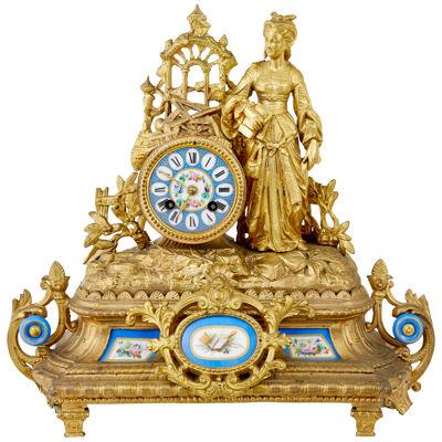 19TH CENTURY FRENCH GILT MANTLE CLOCK WITH SEVRES PLAQUES