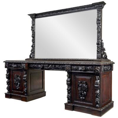 19TH CENTURY CARVED OAK MIRRORED SIDEBOARD OF GRAND PROPORTIONS