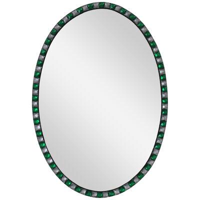 A GEORGIAN STYLE IRISH MIRROR WITH EMERALD GLASS & ROCK CRYSTAL FACETED BORDER
