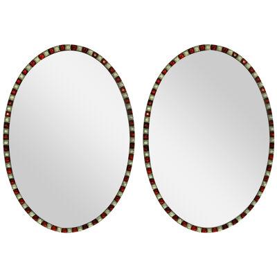 A PAIR OF GEORGIAN STYLE IRISH MIRRORS WITH RUBY GLASS & ROCK CRYSTAL BORDERS