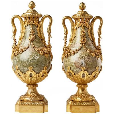 Pair of antique marble vases with bronze mounts