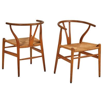 A Pair of Hans Wegner Wishbone Chairs