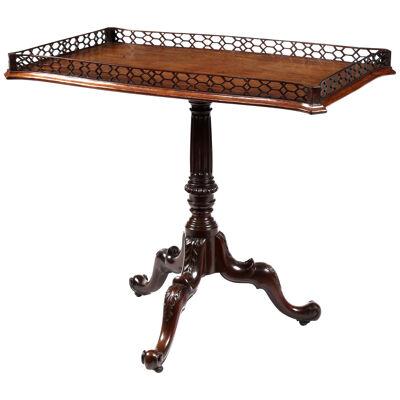George III Irish mahogany serpentine tripod silver table