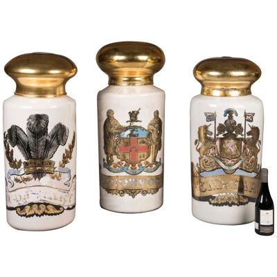A Set of Three Large Hand-Painted Apothecary Jars