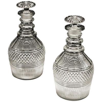 A pair of Regency cut crystal decanters