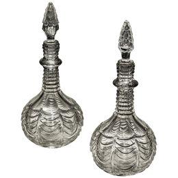 A PAIR OF SCALE CUT VICTORIAN DECANTERS