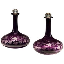 A FINE PAIR AMETHYST PORT & SHERRY DECANTERS