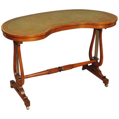 A REGENCY ROSEWOOD KIDNEY SHAPED WRITING TABLE