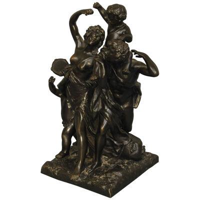19TH CENTURY BRONZE GROUP WITH BACCUS, MAIDENS AND PUTTI