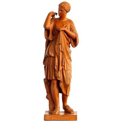 After the Antique a 19th Century terracotta figure of Diana de Gabies. Stamped