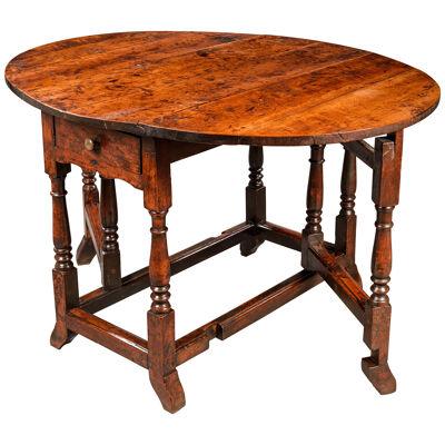 Queen Anne period yew wood gate leg table