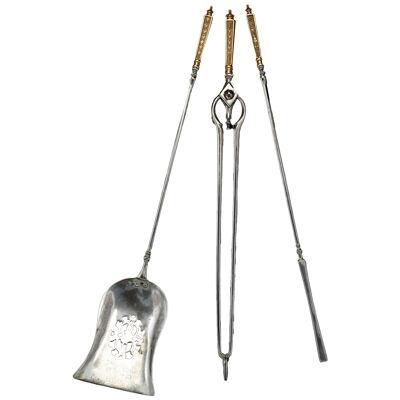 Early Nineteenth Century brass and steel fire tools