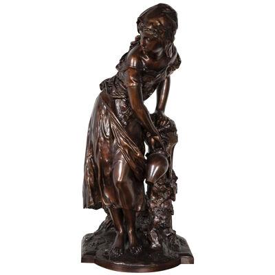 Bronze figure of a maiden filling a jug by a fountain by Mathurin Moreau
