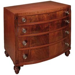 A 19th century bow chest of drawers stamped Gillows