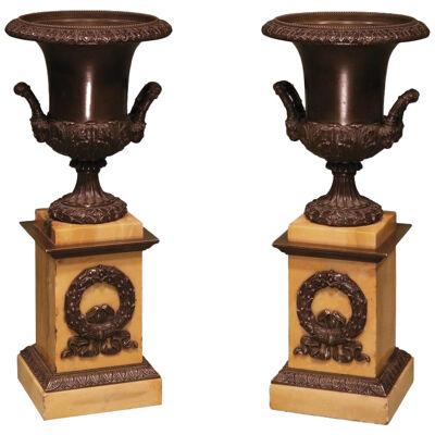 A pair of early 19th Century bronze campana-shaped Urns.