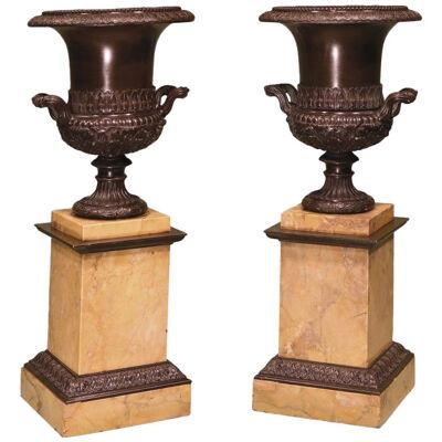 A large pair of early 19th Century bronze campana-shaped Urns.