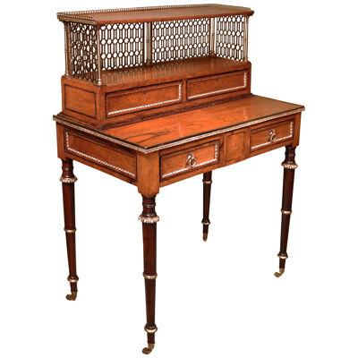 An early 19th century rosewood bonheur du jour in the style of John McLean