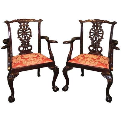 A pair of Chippendale style mahogany Armchairs.