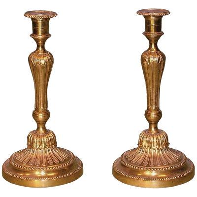 Antique pair of French mid-19th Century ormolu Candlesticks.