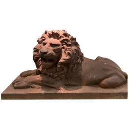 A Pair Of Cast Iron Lions