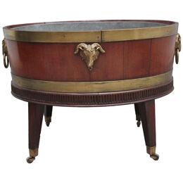 A highly decorative early 19th Century mahogany and brass bound wine cooler