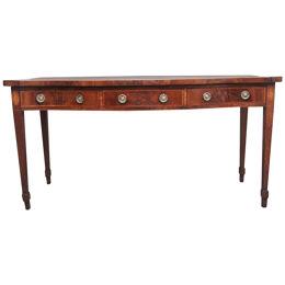 A superb quality early 19th Century mahogany serpentine serving table