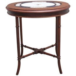 Early 20th Century mahogany occasional table with a ceramic inset