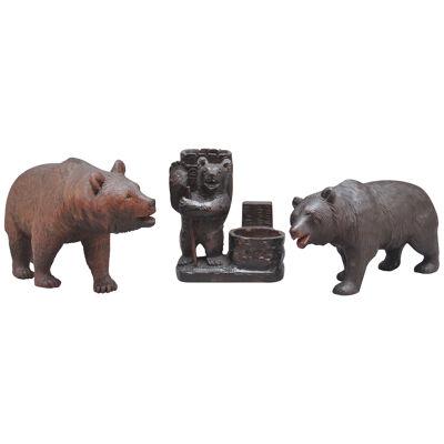 A set of three 19th Century black forest carvings 