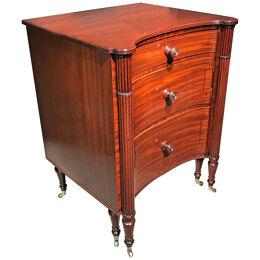 Regency Period Mahogany and ebony line inlaid concave fronted commode